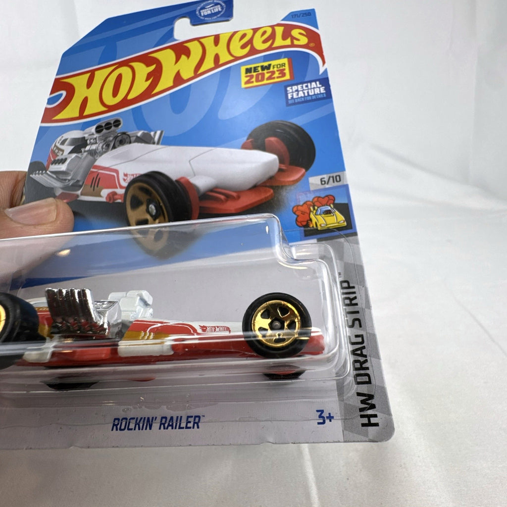 Hot Wheels Rockin' Railer 1:64 scale diecast dragster car in factory sealed packaging