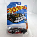 Hot Wheels Count Muscula 1:64 scale diecast muscle car in matte black with sealed blister pack packaging.