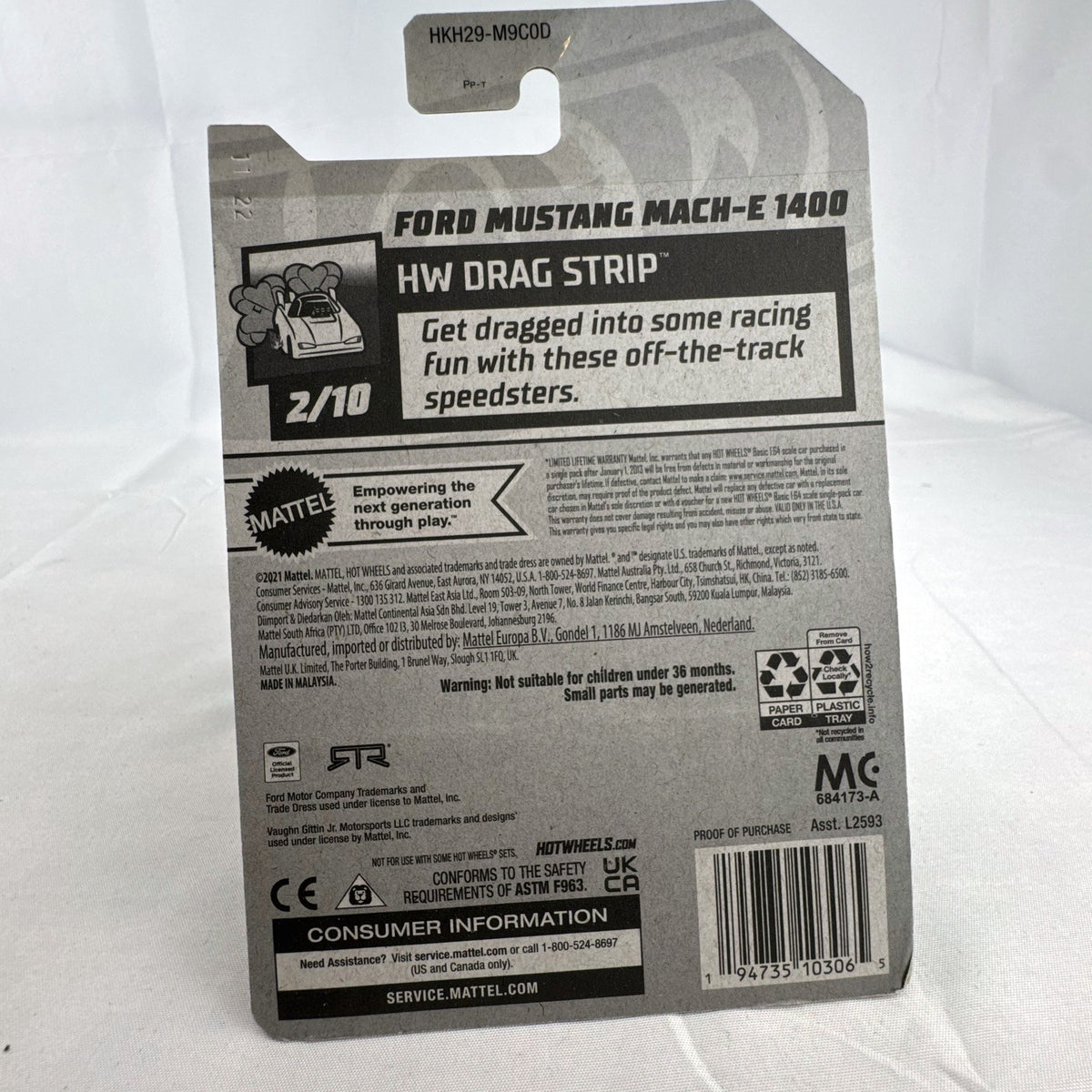 Hot Wheels 1:64 scale dark blue Ford Mustang Mach-E 1400 diecast car in original blister card packaging.
