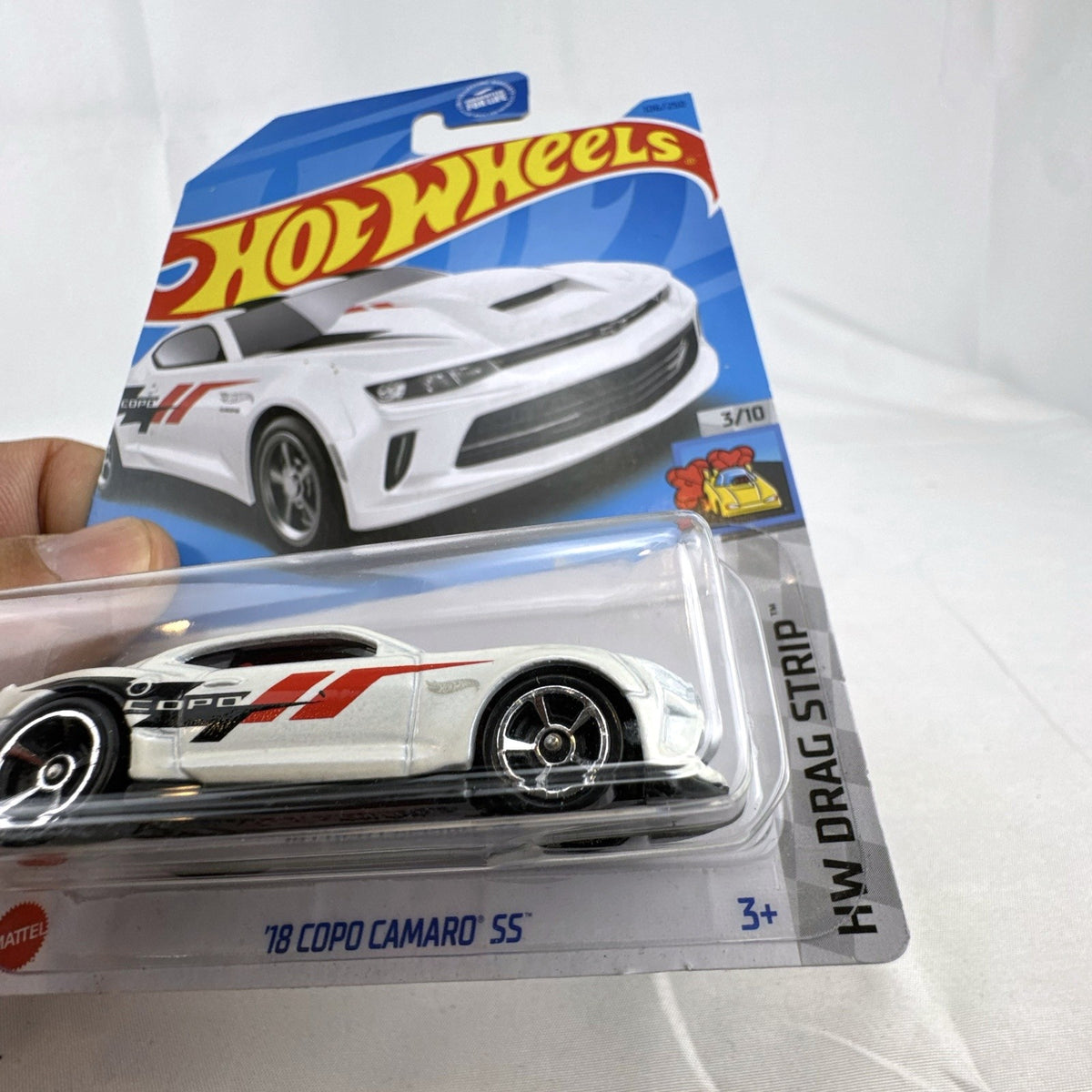 Hot Wheels 2018 Chevy COPO Camaro SS 1:64 scale diecast car sealed on original 2022 HW Drag Strip card.
