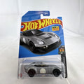 Hot Wheels 1:64 scale El Segundo Coupe diecast car in silver, sealed on original HW Dream Garage card.