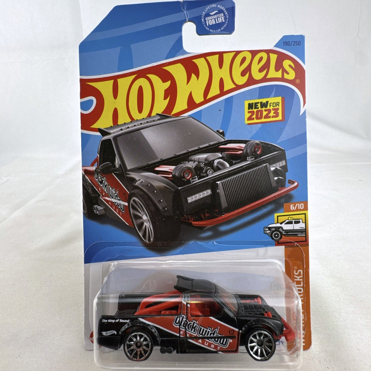 Hot Wheels 1:64 scale Limited Grip drift pickup truck in black with red Black Widow Exhaust livery factory sealed on card