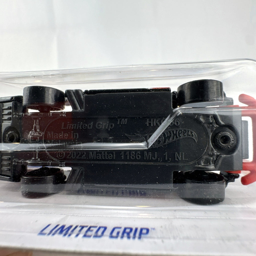 Hot Wheels 1:64 scale Limited Grip drift pickup truck in black with red Black Widow Exhaust livery factory sealed on card