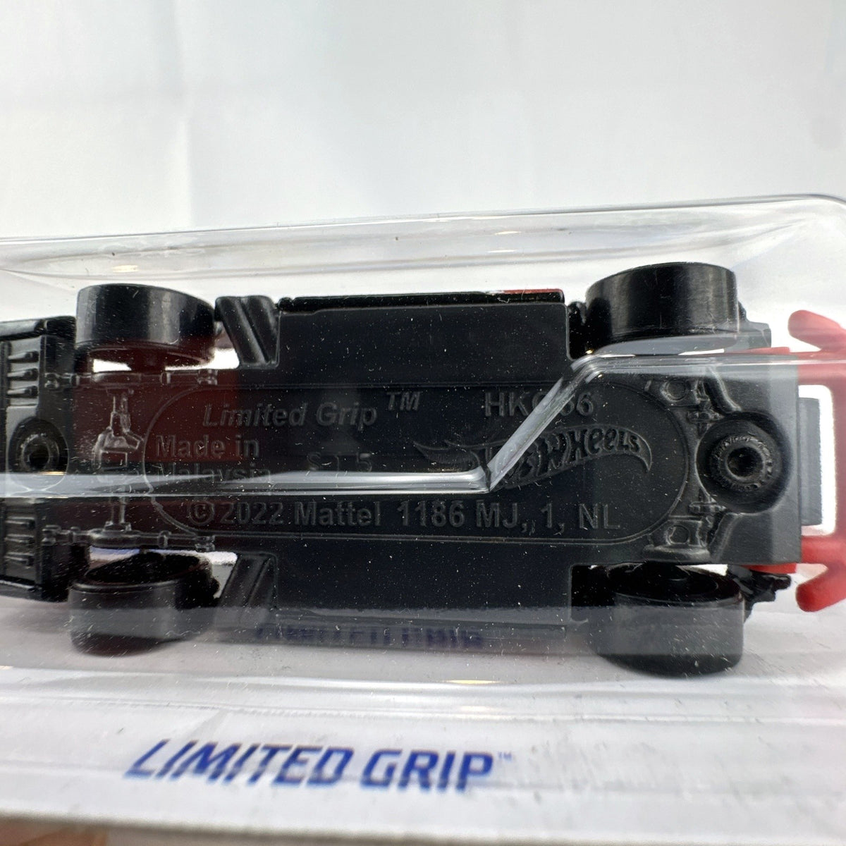Hot Wheels 1:64 scale Limited Grip drift pickup truck in black with red Black Widow Exhaust livery factory sealed on card