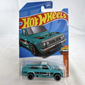 Hot Wheels 1:64 scale Mazda REPU pickup truck in teal, factory sealed on card