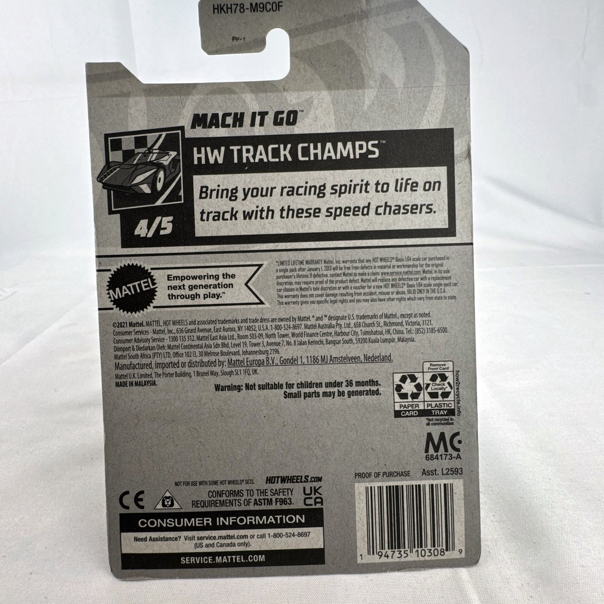 Hot Wheels Mach It Go 1:64 scale diecast car in translucent green sealed on original HW Track Champs blister card.