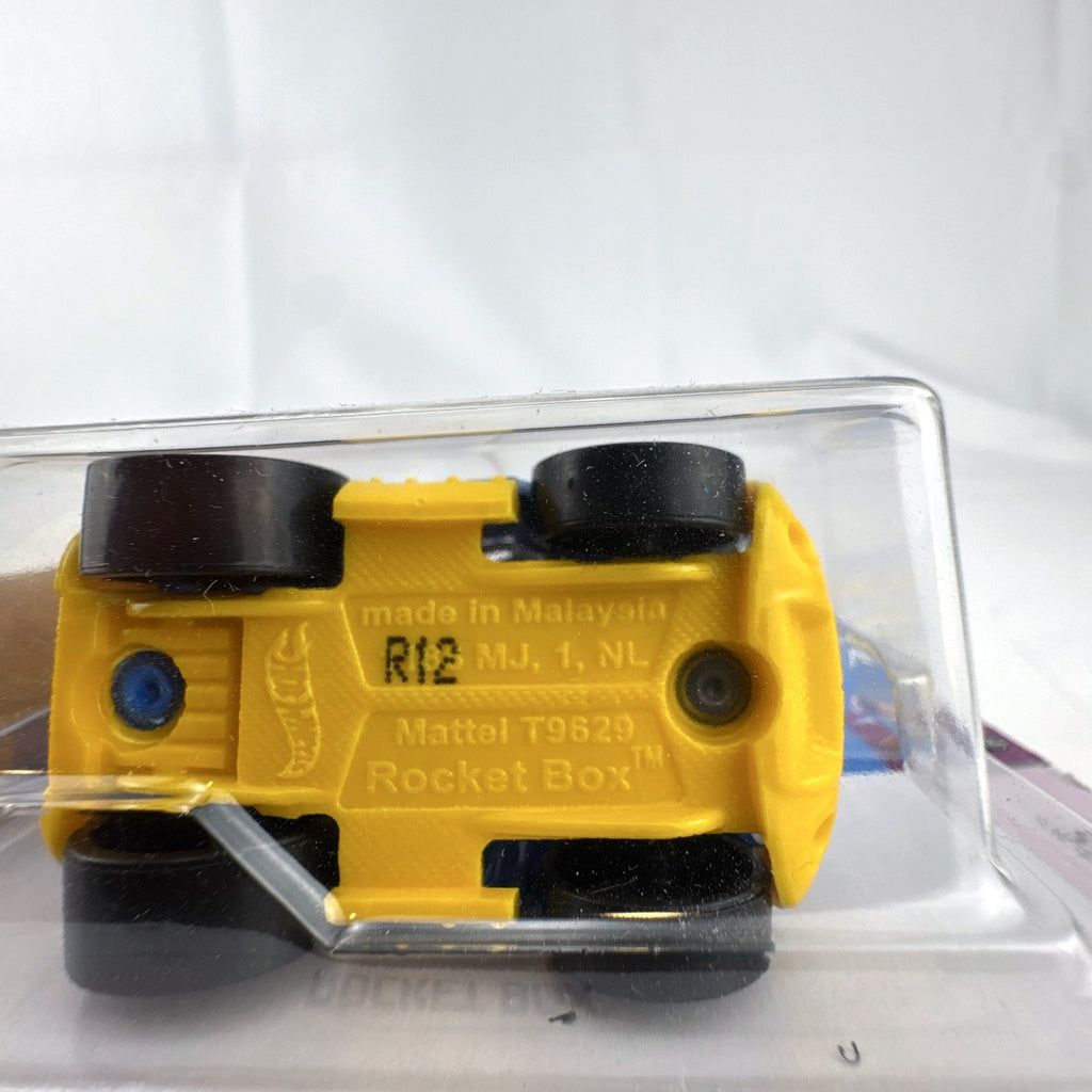 Factory sealed Hot Wheels Rocket Box 1:64 scale blue and yellow diecast car on blister card