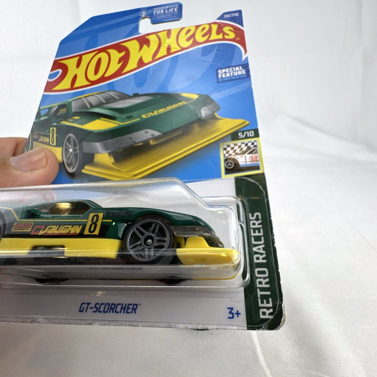 Factory sealed 2022 Hot Wheels GT-Scorcher 1:64 scale diecast car in green with Ryu Asada card art