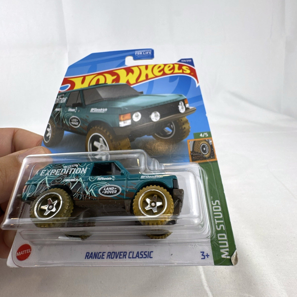 Hot Wheels 1:64 scale Land Rover Range Rover Classic Mud Studs diecast vehicle in teal sealed on original blister card