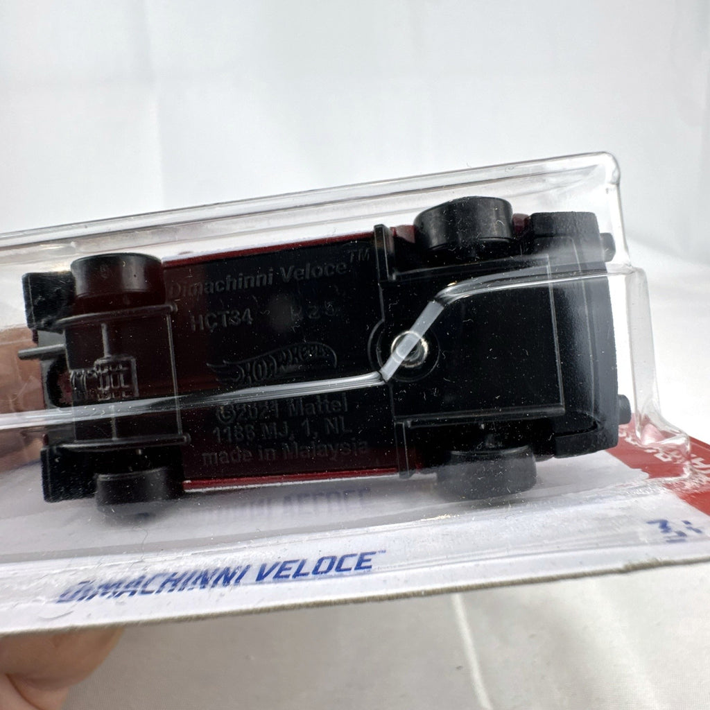 Hot Wheels 1:64 scale Dimachinni Veloce red diecast rally car sealed on 2022 HW Daredevils blister card.