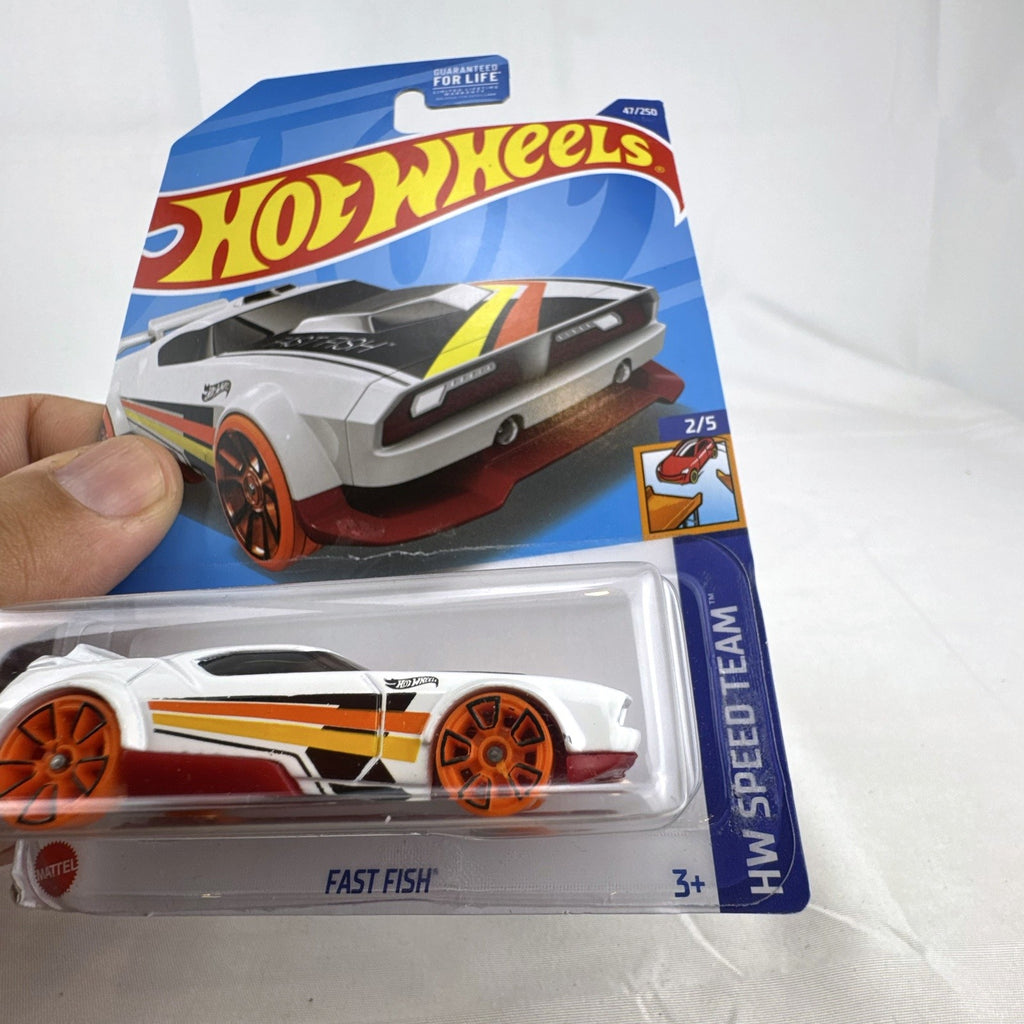 Hot Wheels 1:64 Fast Fish diecast car in white with orange wheels on original sealed blister card
