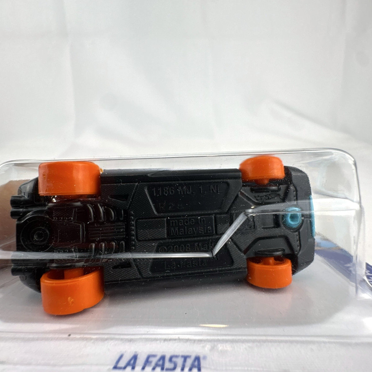 Hot Wheels La Fasta 1:64 scale light blue diecast car sealed on original HW Speed Team blister card.