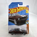 Hot Wheels 1:64 scale 1965 Ford Mustang 2+2 Fastback diecast car in dark maroon with white racing stripes factory sealed.