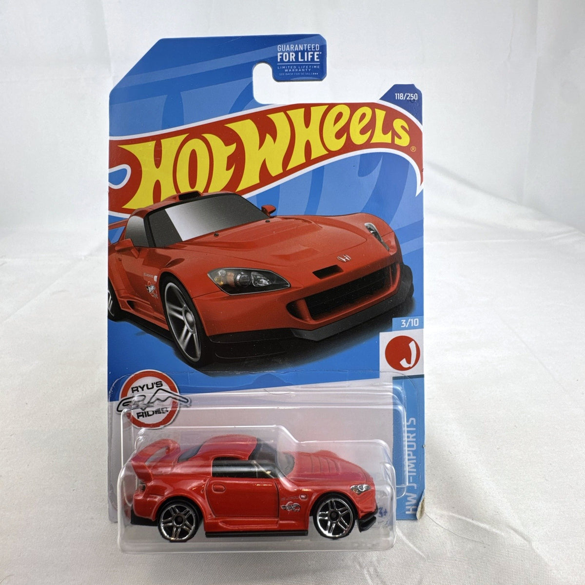Hot Wheels 1:64 scale Honda S2000 in red diecast on original unopened card package