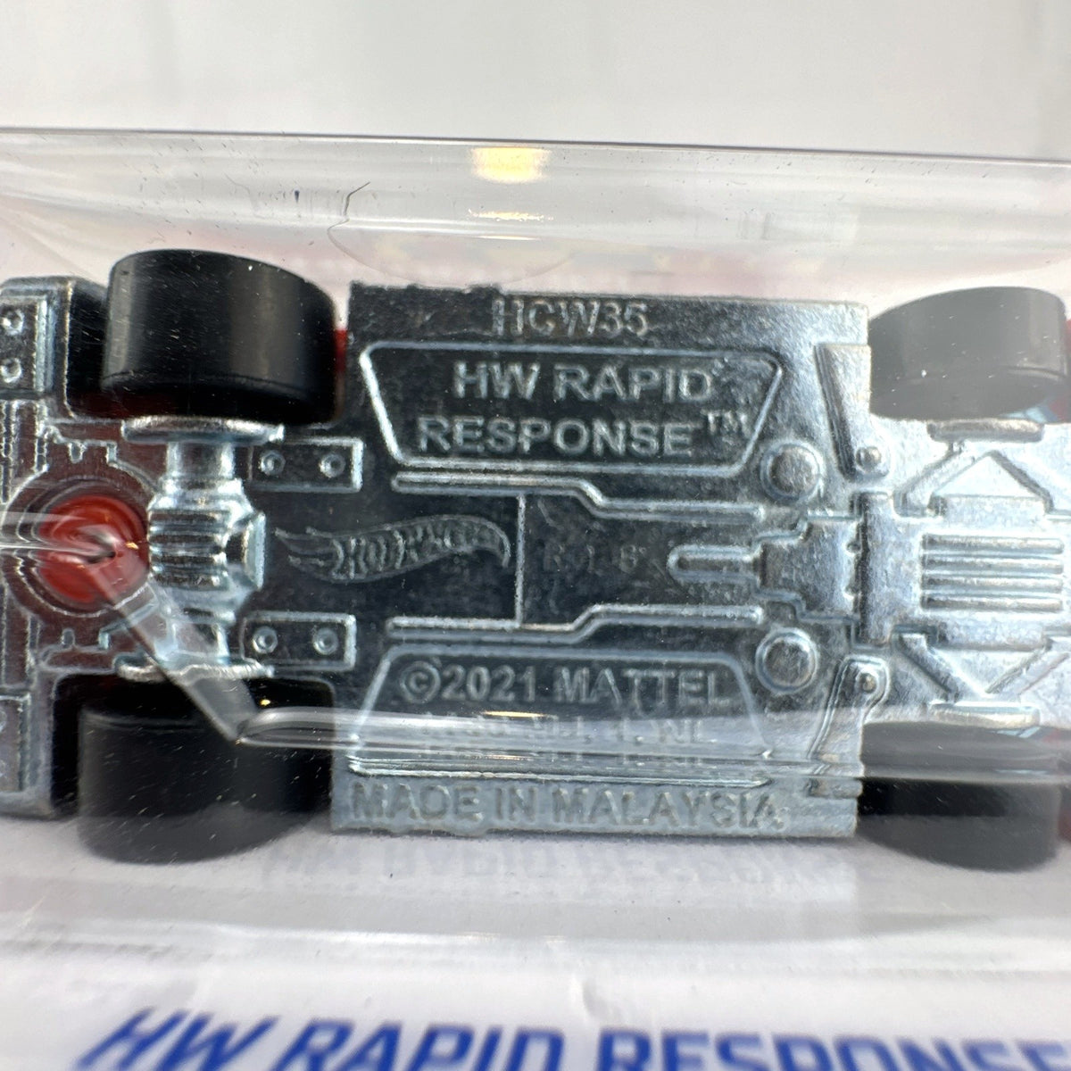 Hot Wheels HW Rapid Response emergency ambulance 1:64 scale red diecast car sealed on original card packaging.