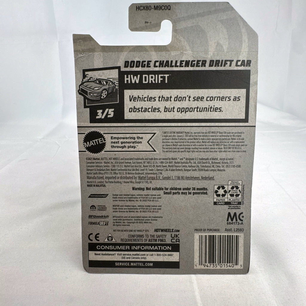 Hot Wheels 1:64 scale red Dodge Challenger Drift Car sealed on card with Mopar and Formula Drift graphics.