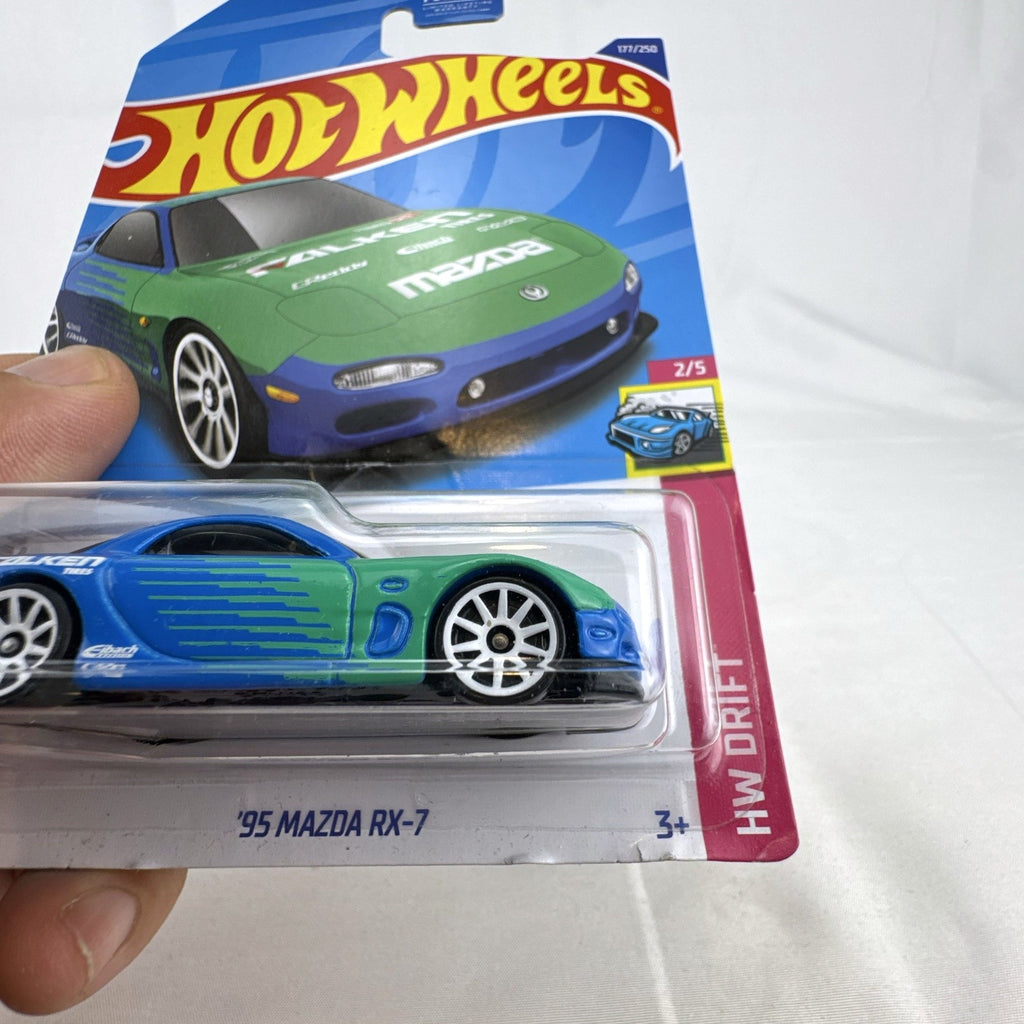 Hot Wheels 1995 Mazda RX-7 Falken Tires edition 1:64 scale diecast car factory sealed on packaging card.