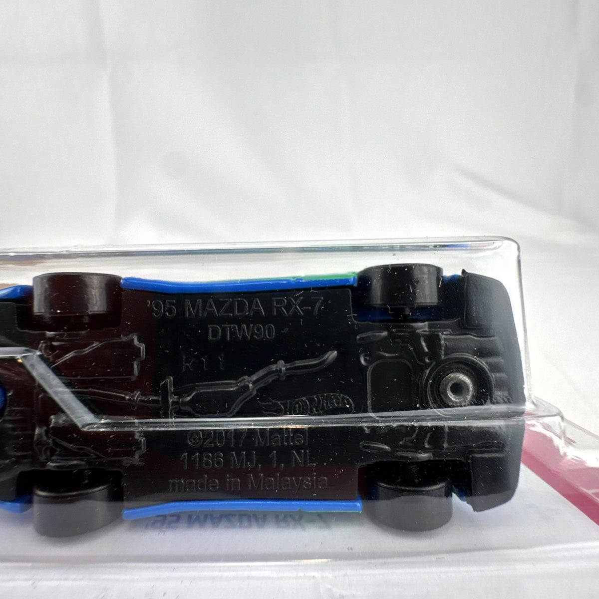 Hot Wheels 1995 Mazda RX-7 Falken Tires edition 1:64 scale diecast car factory sealed on packaging card.