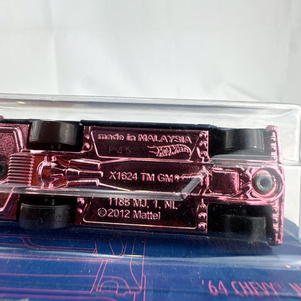 Hot Wheels 54th Anniversary 1:64 scale 1964 Chevy Nova Wagon diecast car in dark blue and pink original sealed packaging