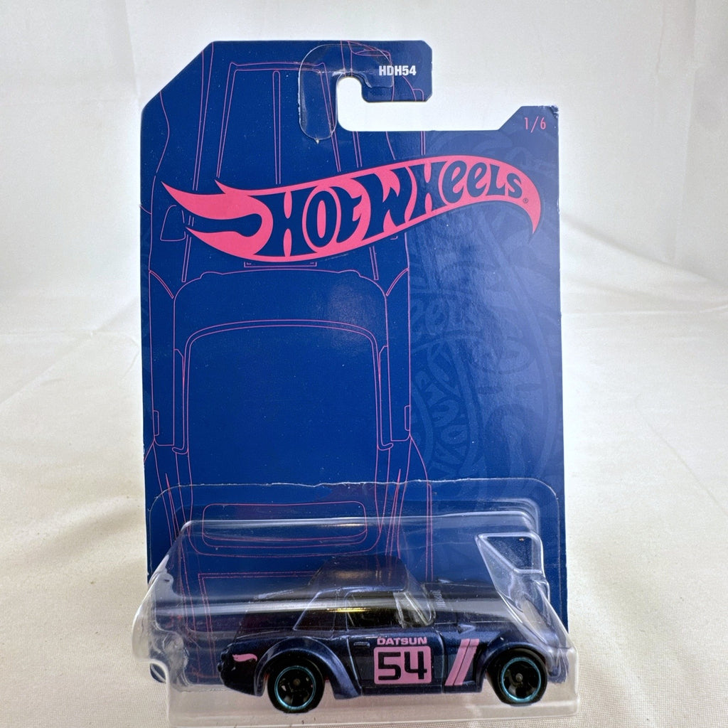 Hot Wheels 1:64 scale Datsun Fairlady 2000 54th Anniversary diecast car sealed on blister card.