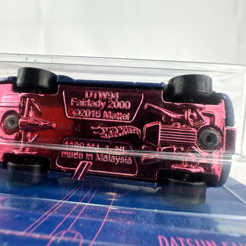 Hot Wheels 1:64 scale Datsun Fairlady 2000 54th Anniversary diecast car sealed on blister card.