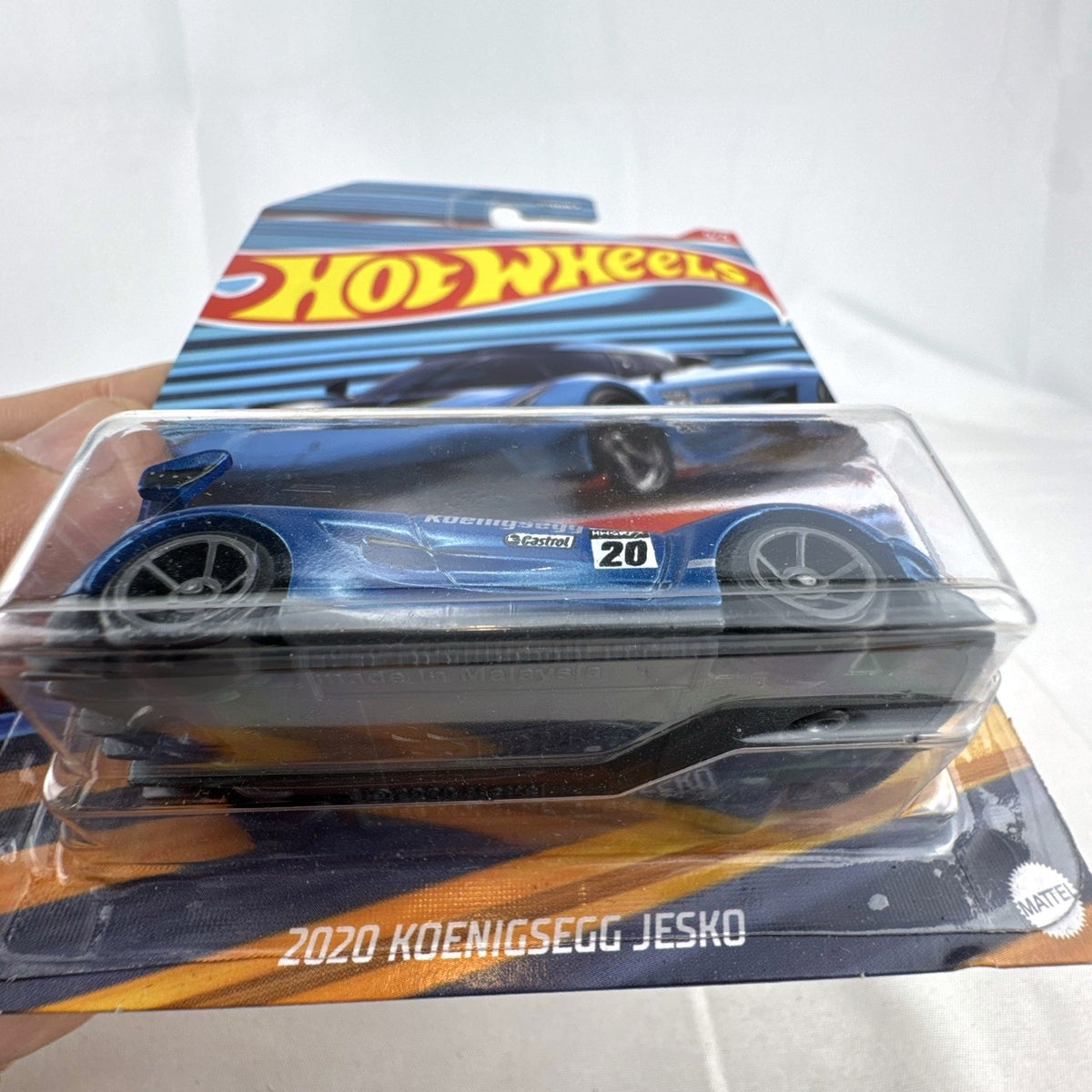 Hot Wheels 1:64 scale 2020 Koenigsegg Jesko diecast supercar in metallic blue Castrol livery, unopened on original card