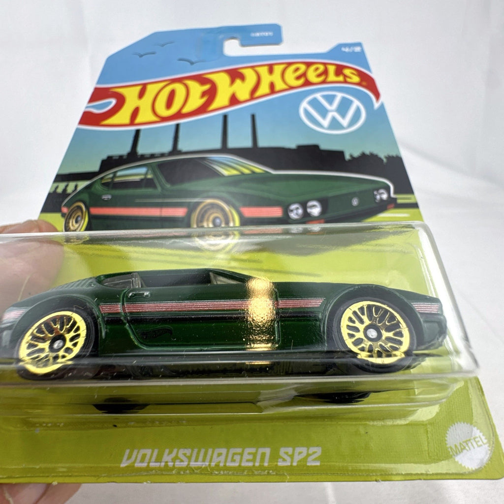 Hot Wheels 1:64 scale Volkswagen SP2 diecast car in green with gold wheels sealed on original packaging card