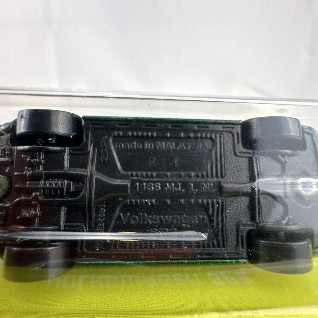 Hot Wheels 1:64 scale Volkswagen SP2 diecast car in green with gold wheels sealed on original packaging card