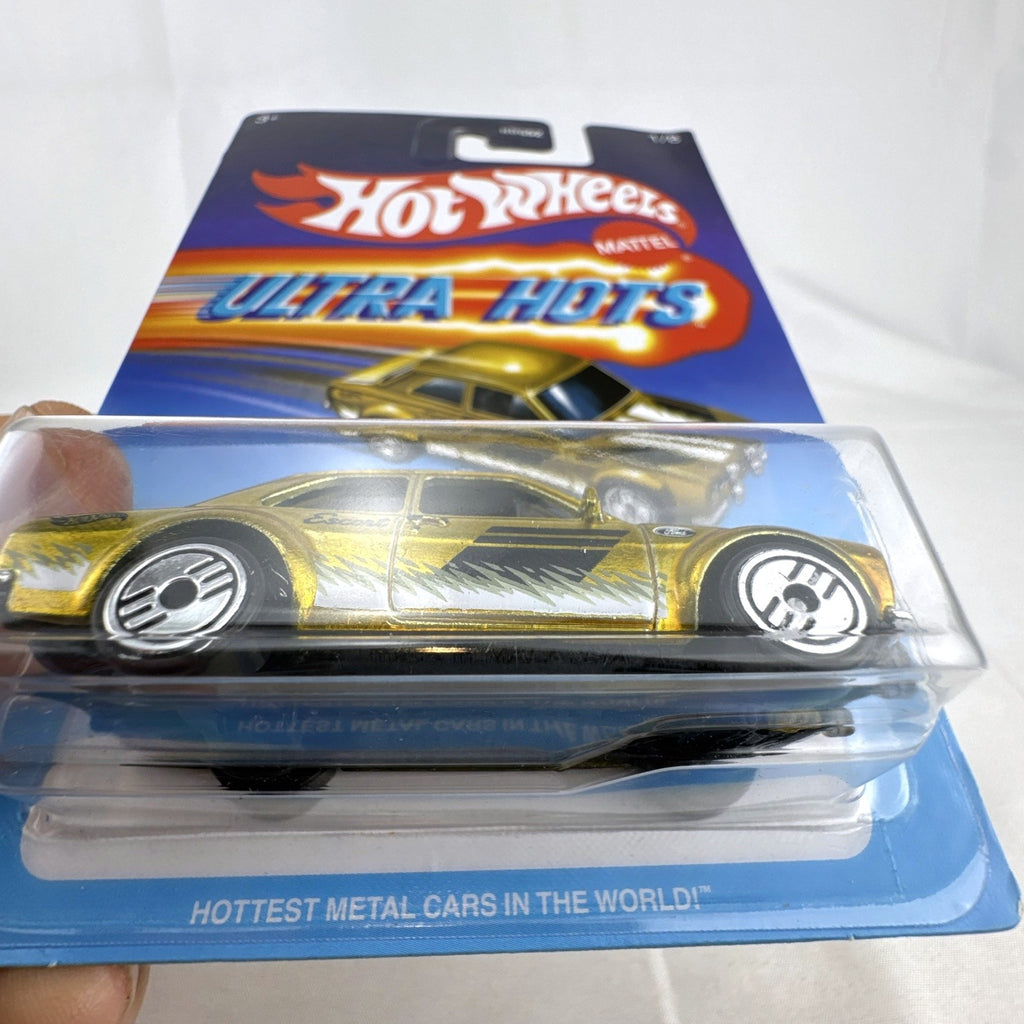 Hot Wheels Ultra Hots 1970 Ford Escort RS1600 1:64 diecast car in gold sealed on card
