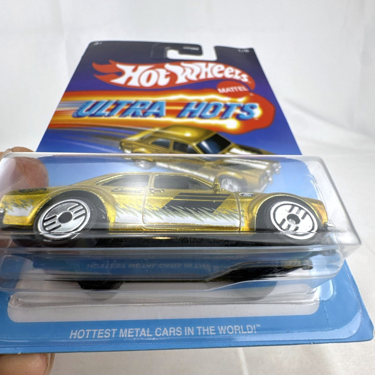 Hot Wheels Ultra Hots 1970 Ford Escort RS1600 1:64 diecast car in gold sealed on card