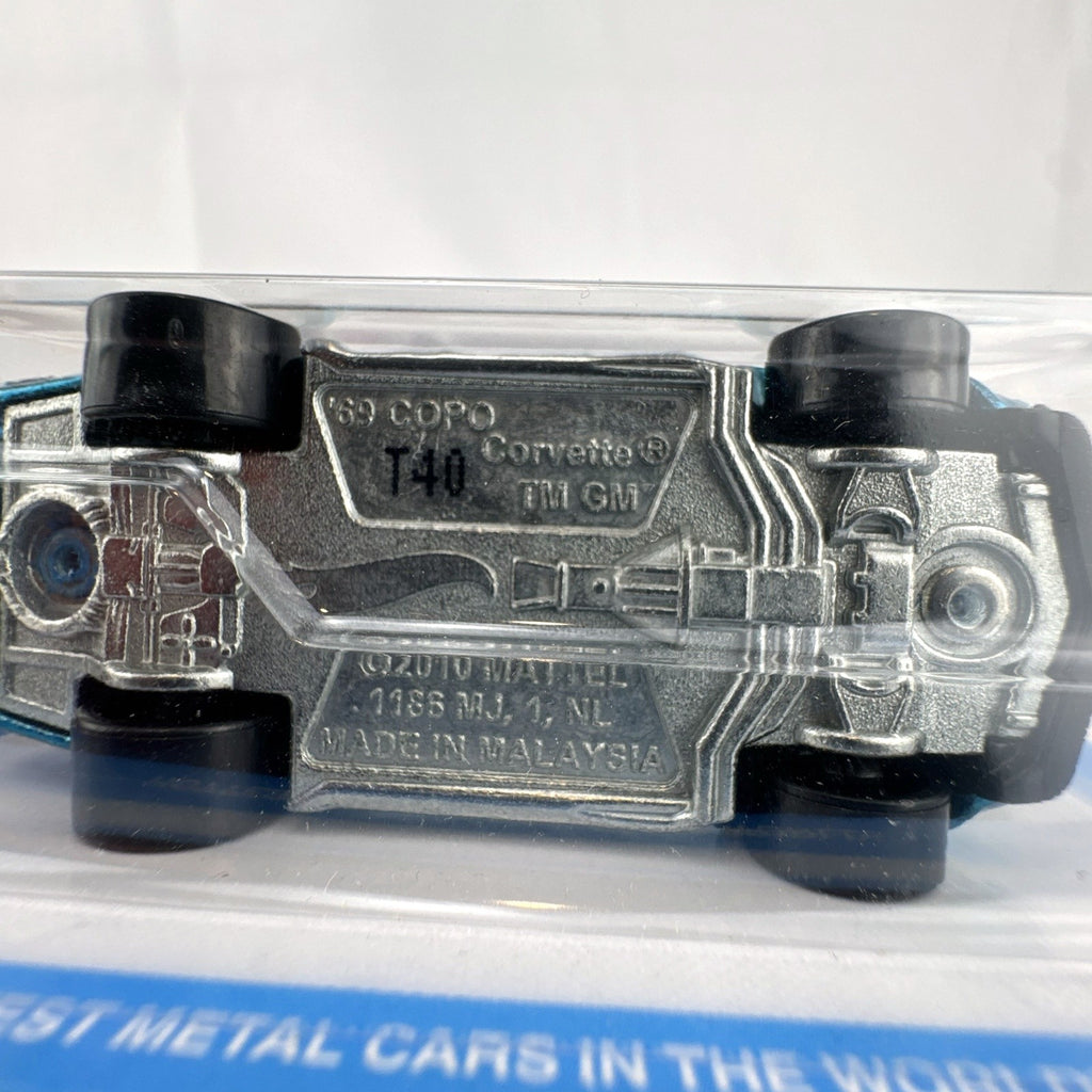 Hot Wheels Ultra Hots 1969 Chevrolet COPO Corvette 1:64 scale metallic blue diecast car packaged on card
