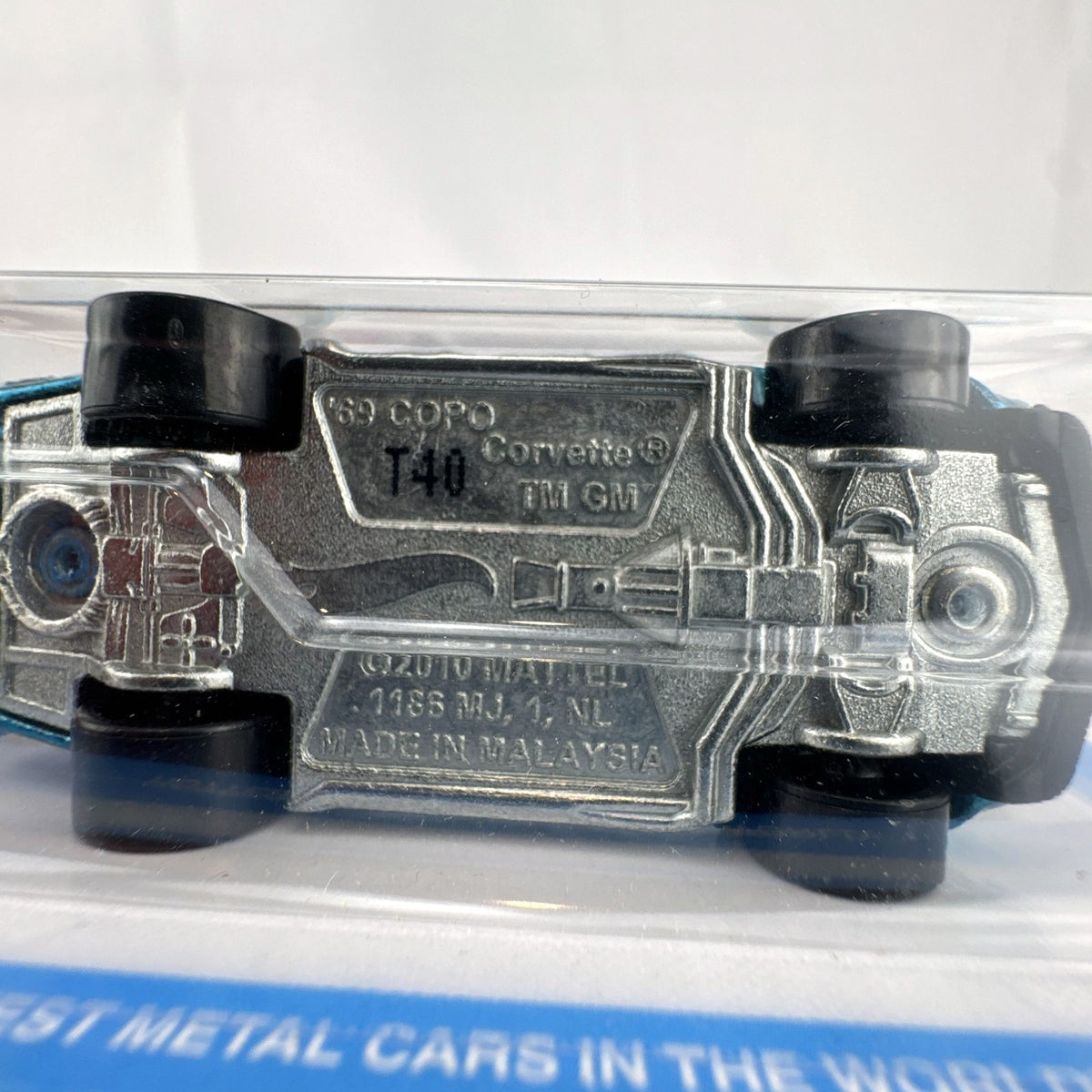 Hot Wheels Ultra Hots 1969 Chevrolet COPO Corvette 1:64 scale metallic blue diecast car packaged on card