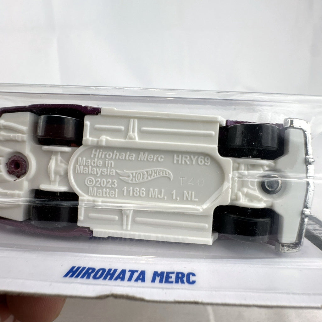 Hot Wheels 2024 Rod Squad Hirohata Merc 1:64 scale diecast car in metallic purple on original unopened blister card