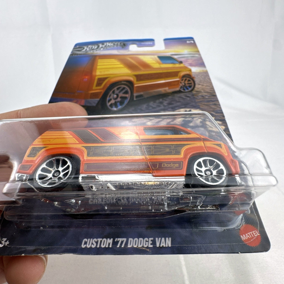 Hot Wheels Custom '77 Dodge Van 1:64 diecast in orange from the Surf's Up Silver Series, sealed on card