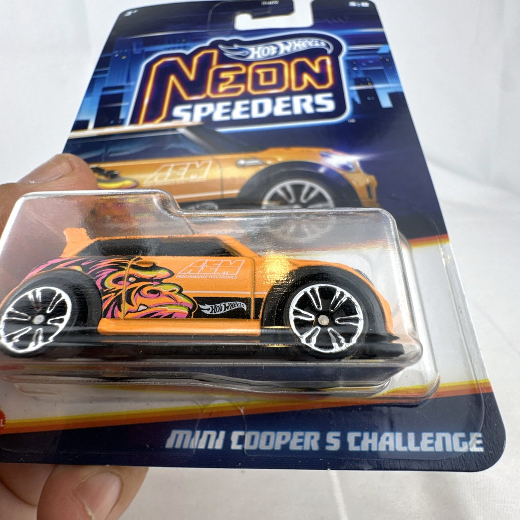 Hot Wheels 1:64 scale orange MINI Cooper S Challenge Neon Speeders diecast car sealed on original blister card.
