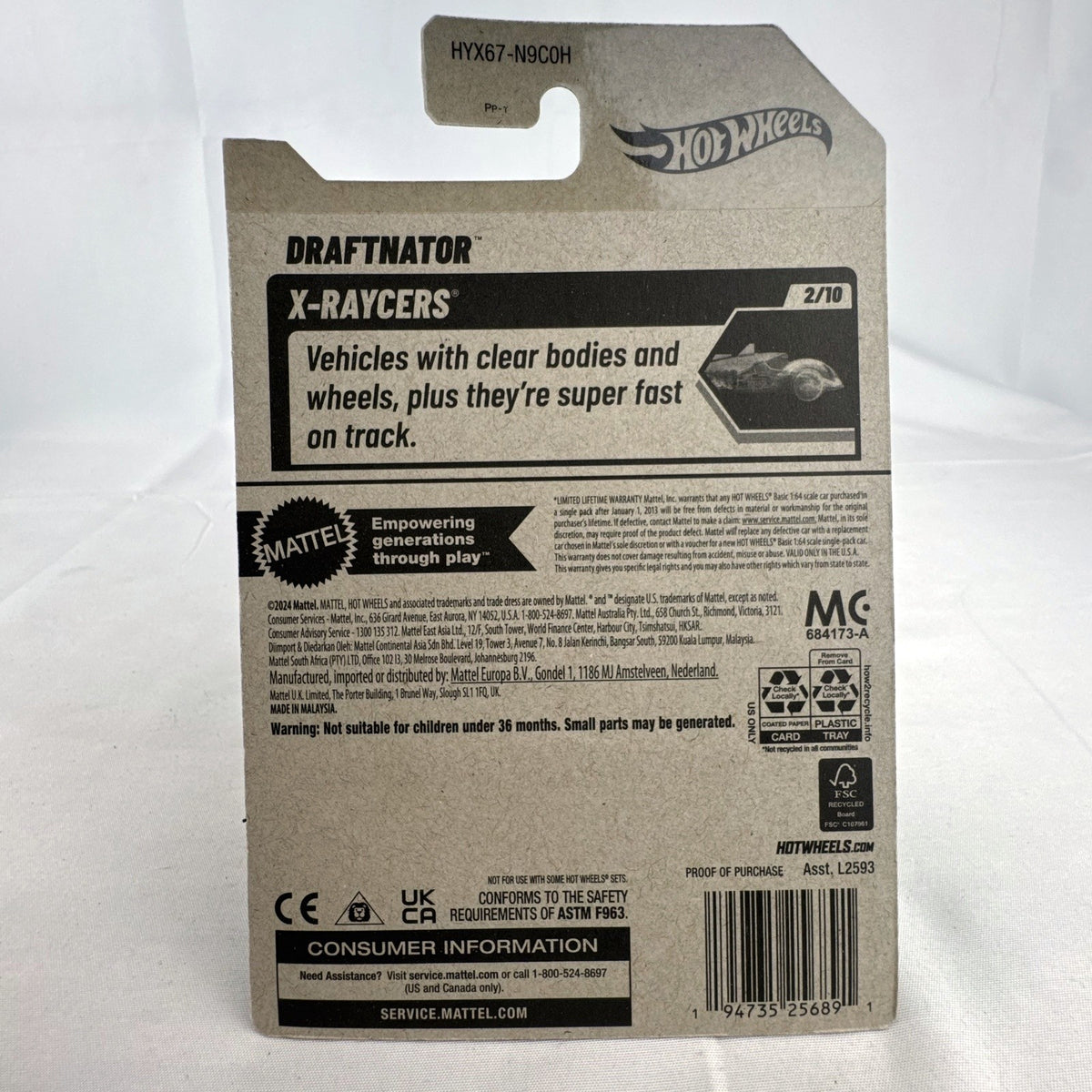 Hot Wheels Draftnator 1:64 scale black translucent diecast pickup truck in sealed X-Raycers packaging.
