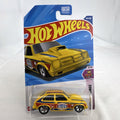 Hot Wheels 1:64 scale 1976 Chevy Chevette NHRA Dragster diecast car in yellow, unopened packaging.