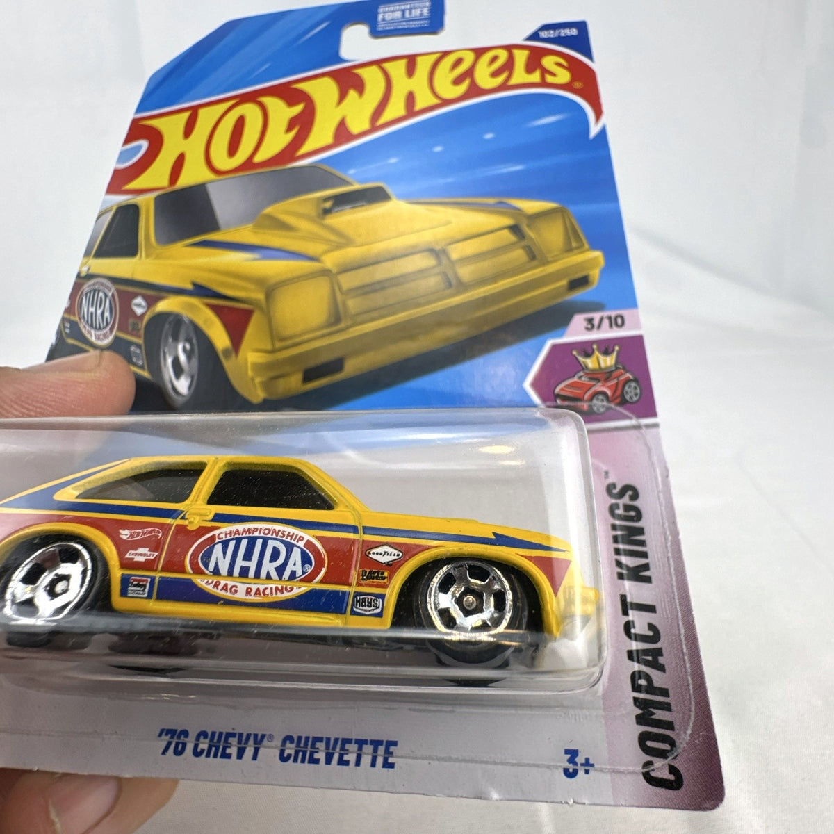 Hot Wheels 1:64 scale 1976 Chevy Chevette NHRA Dragster diecast car in yellow, unopened packaging.