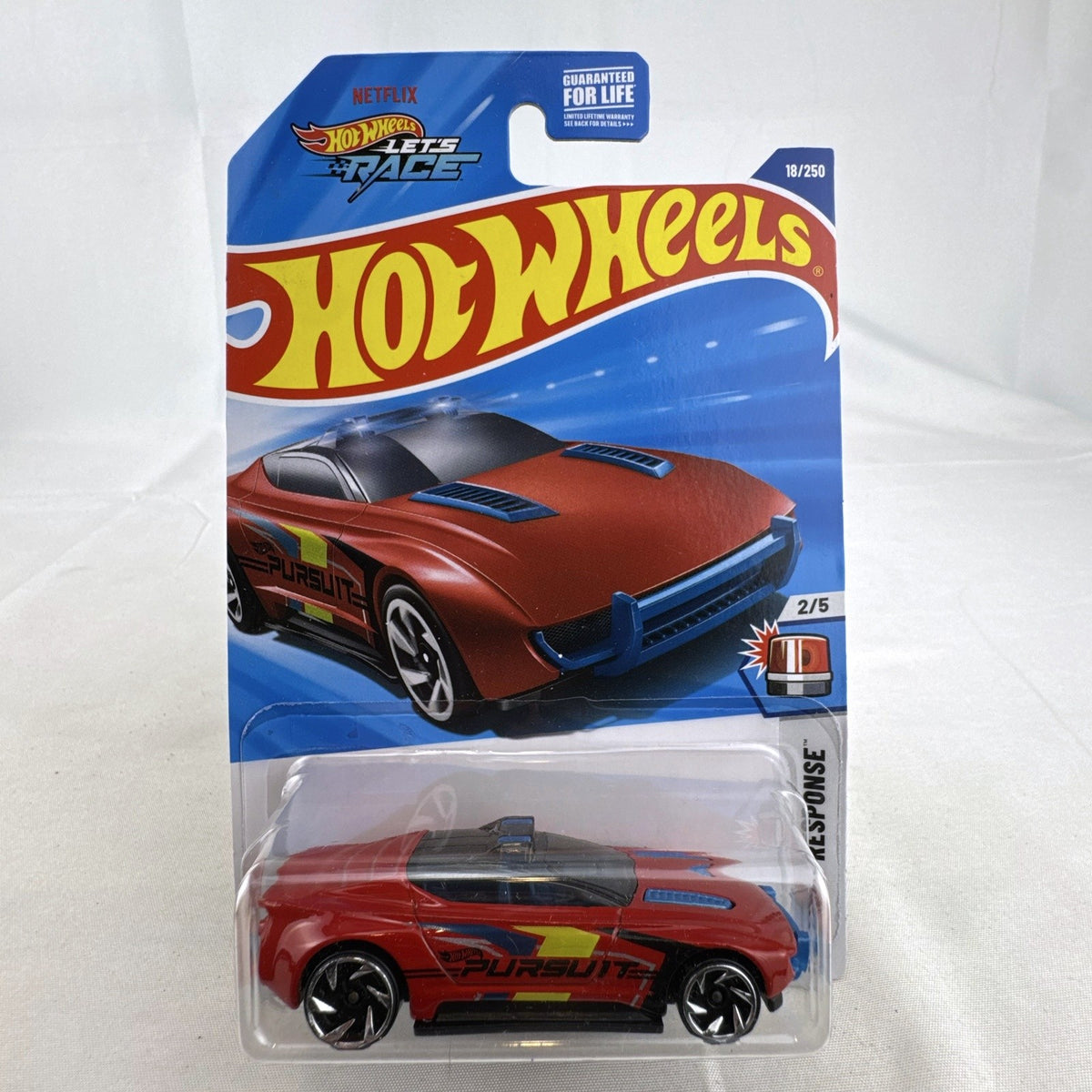 Red Hot Wheels 1:64 scale Alpha Pursuit diecast vehicle in factory-sealed HW First Response blister pack.