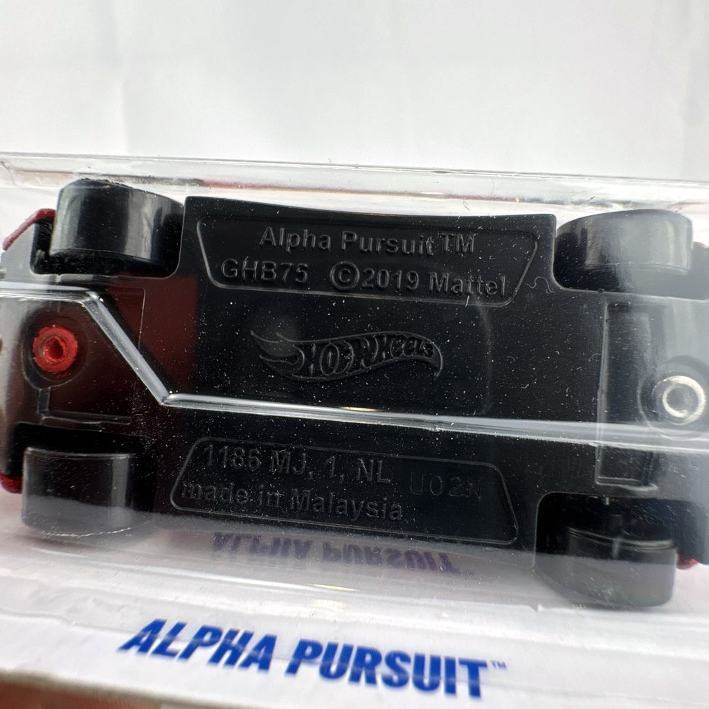 Red Hot Wheels 1:64 scale Alpha Pursuit diecast vehicle in factory-sealed HW First Response blister pack.