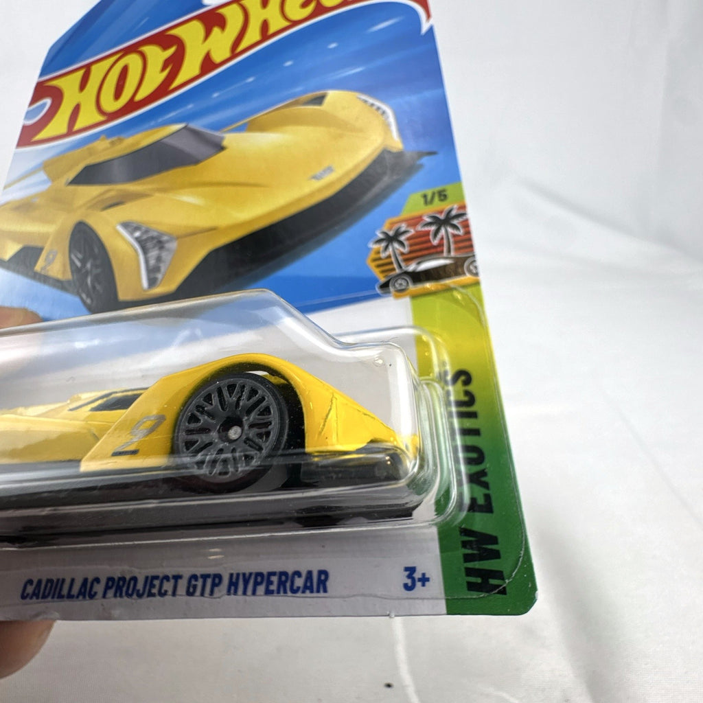 Hot Wheels 1:64 scale Cadillac Project GTP Hypercar in yellow, factory sealed on original blister card.