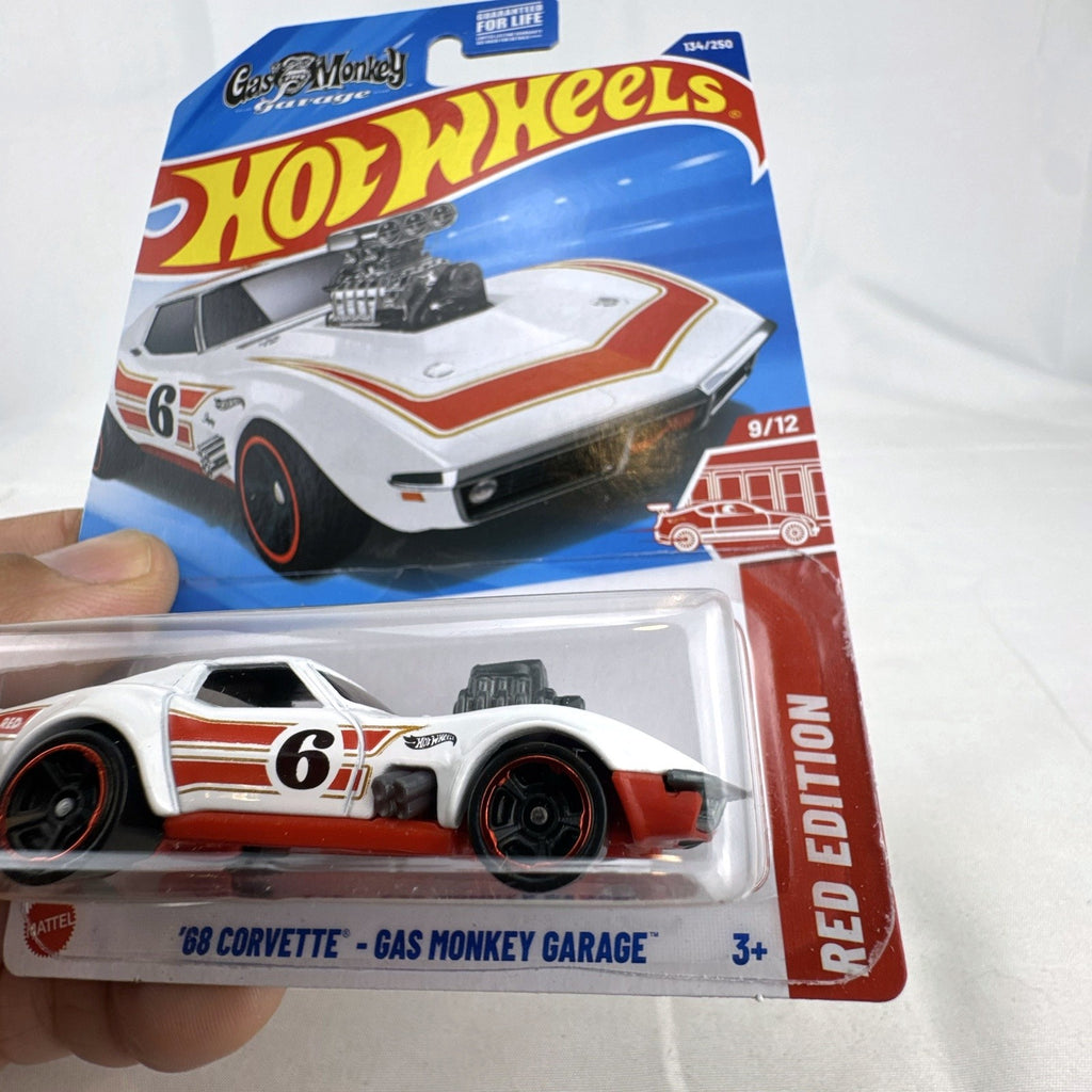 Hot Wheels 1:64 scale '68 Chevy Corvette Gas Monkey Garage Target Red Edition diecast car in sealed packaging