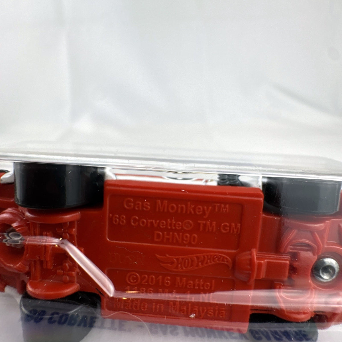 Hot Wheels 1:64 scale '68 Chevy Corvette Gas Monkey Garage Target Red Edition diecast car in sealed packaging