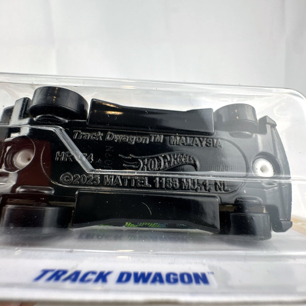 Hot Wheels 2024 HW Wagons Track Dwagon 1:64 scale white diecast car sealed in original card packaging.