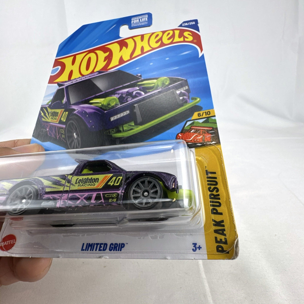 Hot Wheels Limited Grip diecast drift pickup truck in metallic purple sealed on original Peak Pursuit card