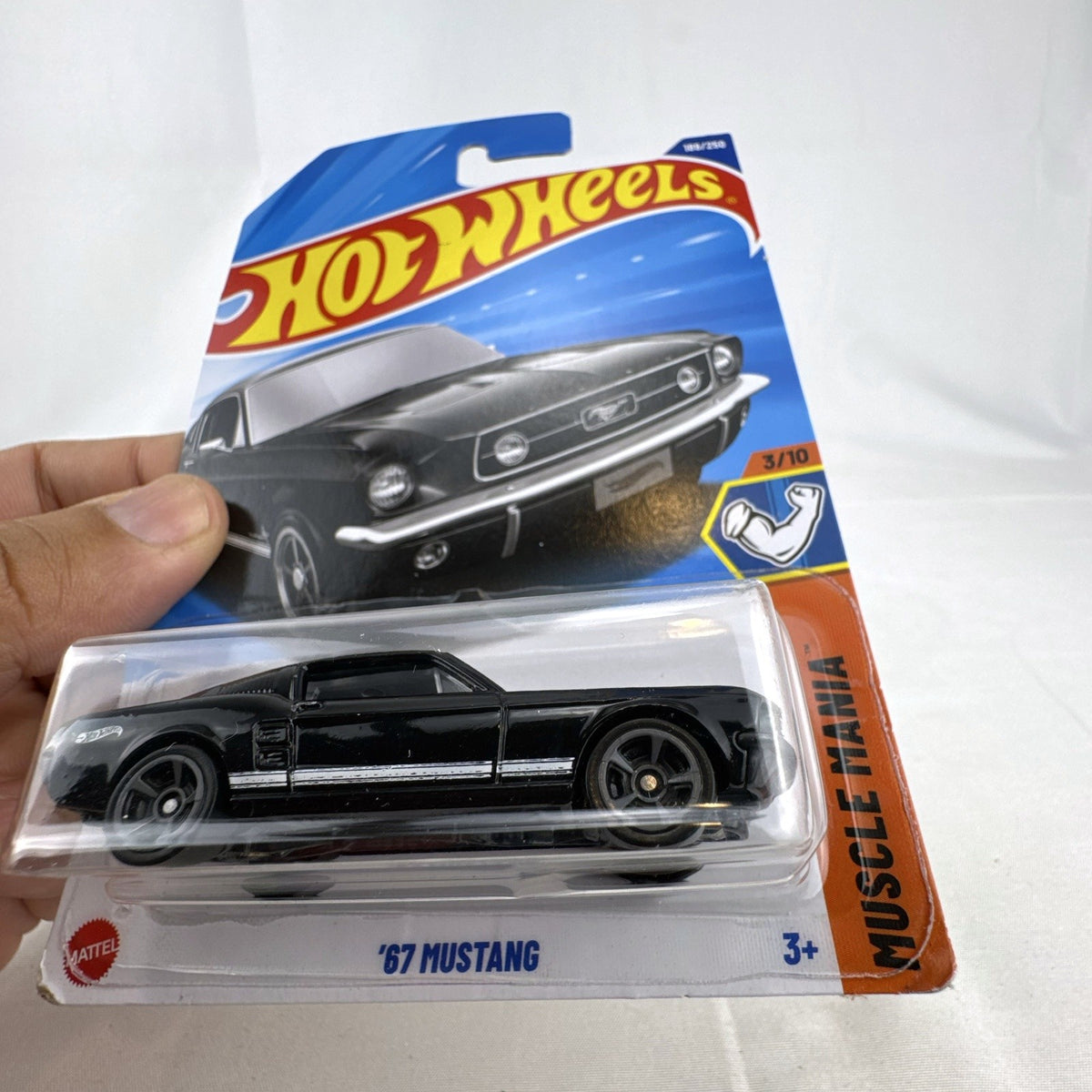 Hot Wheels 1:64 scale 1967 Ford Mustang diecast car in black from the Muscle Mania series