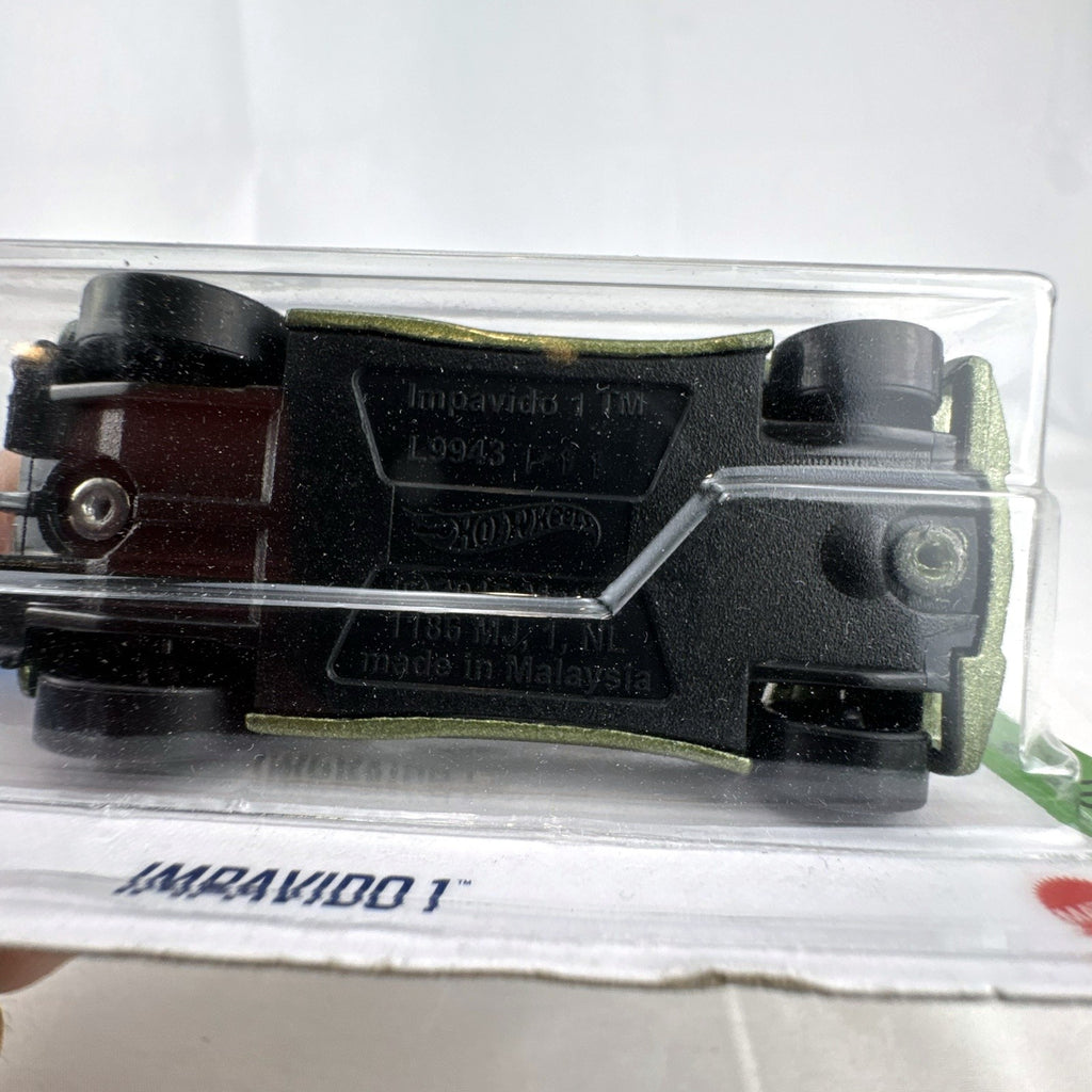 Sealed Hot Wheels Impavido 1 diecast car in metallic green with white stripes, 1:64 scale HW Exotics series.