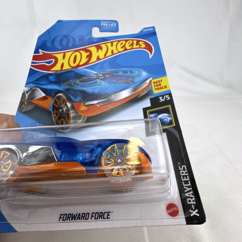 Hot Wheels 1:64 scale Forward Force diecast car in translucent blue from the 2021 X-Raycers series sealed on packaging.