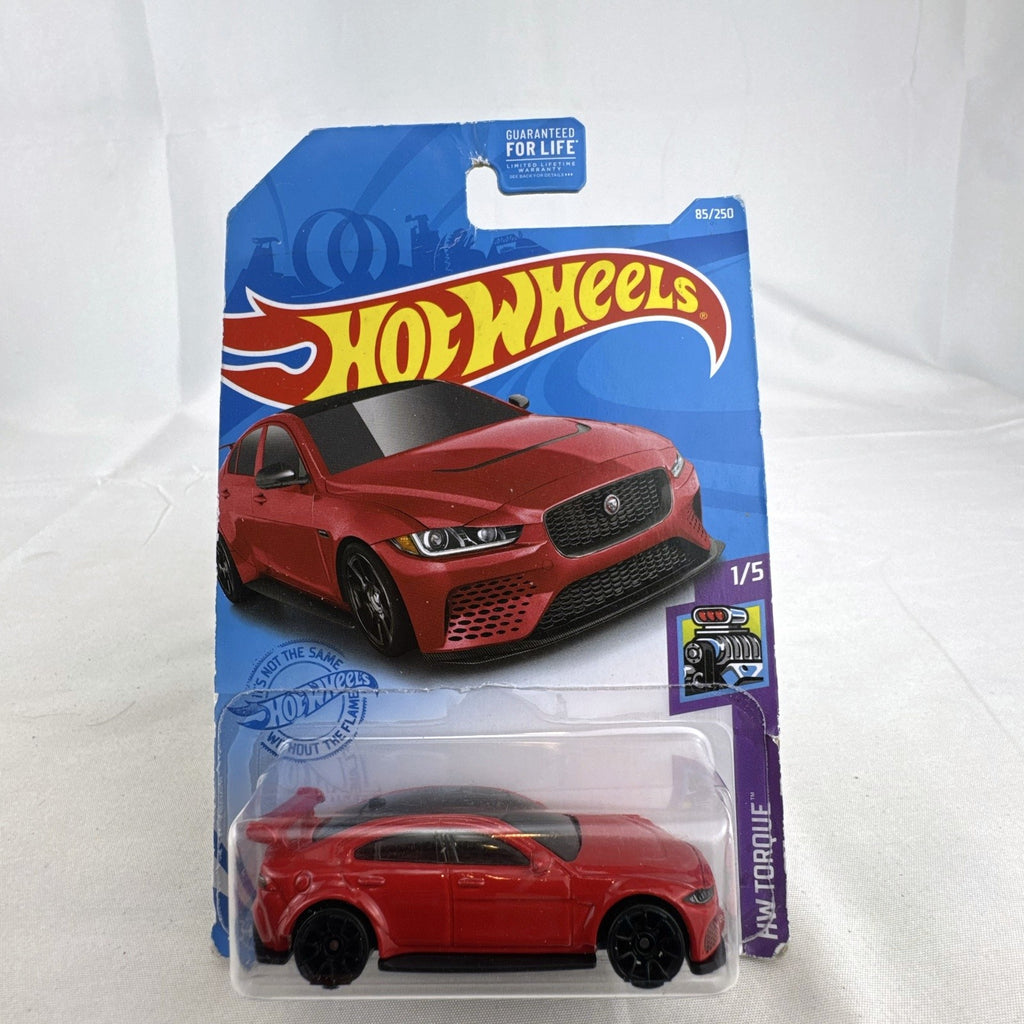 Hot Wheels 1:64 scale Jaguar XE SV Project 8 diecast car in red sealed on original HW Torque packaging card.