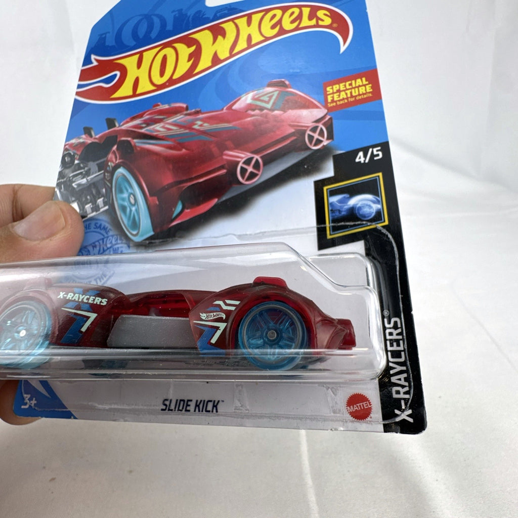Sealed 2021 Hot Wheels Slide Kick 1:64 diecast car in translucent red from the X-Raycers series.